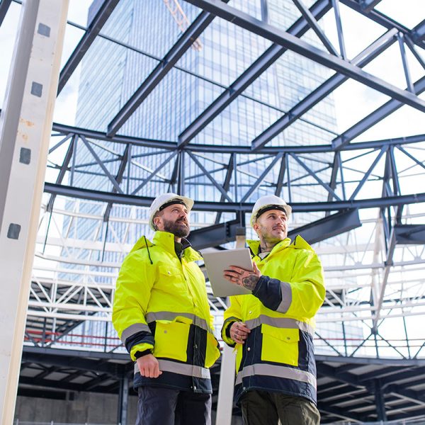 men-engineers-standing-outdoors-on-construction-si-small.jpg